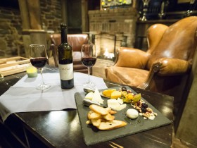 The Speakeasy with wine and cheese